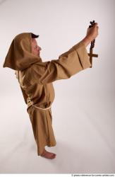 JOEL_ADAMSON MONK WITH CRUCIFIX